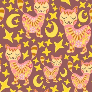 Sleeping kittens with stars and moon on a brown background