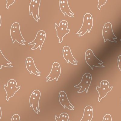 Minimalist boho style ghosts - halloween spooky season ghost outline freehand drawing white on burnt orange caramel
