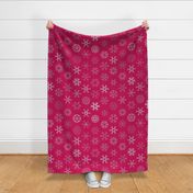 Calligraphic Christmas snowflakes on cranberry red