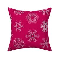 Calligraphic Christmas snowflakes on cranberry red