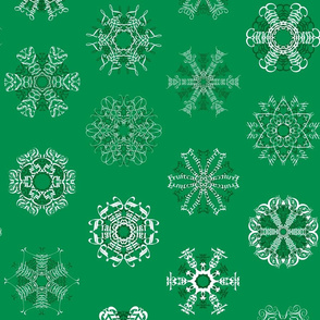 Calligraphic Christmas snowflakes on holly green