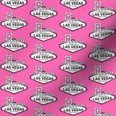 small Las Vegas sign on pink