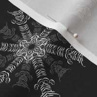 Calligraphic Christmas snowflakes on black