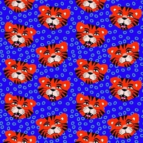 Pop-Art Cutout Style Orange Tigers on a Blue Background