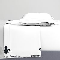  Property of Downton. Tea Towel. Fleur de Lis. Black & White.