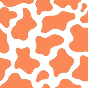 Large Scale Cow Print in Peach on White