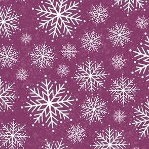 Snowflakes on magenta