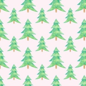 Green Christmas trees on pastel pink background