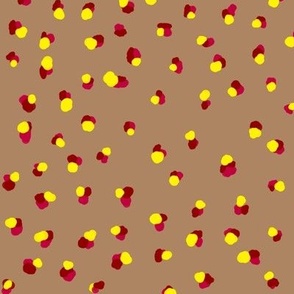 Red and Yellow Acrylic Dots on Brown Background