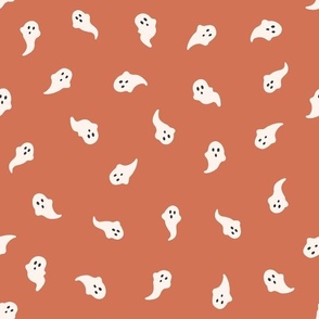 little ghosts on dusty orange