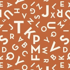 Tossed boho alphabet - minimalist abc in mid-century retro font typography back to school design ivory on burnt orange 