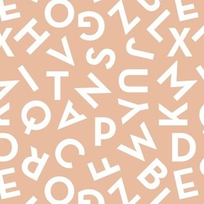 Tossed alphabet ABC - minimalist text mid-century retro font typography back to school design white on blush apricot 