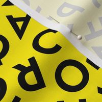 Tossed alphabet ABC - minimalist text mid-century retro font typography back to school design black on neon yellow 