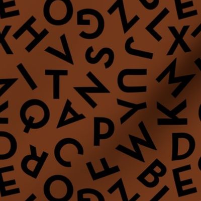 Tossed alphabet ABC - minimalist text mid-century retro font typography back to school design black on rust brown 