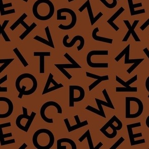 Tossed alphabet ABC - minimalist text mid-century retro font typography back to school design black on rust brown 