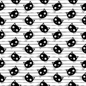 cute black cat head with stripes white small scale
