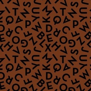 Tossed alphabet ABC - minimalist text mid-century retro font typography back to school design black on rust brown  SMALL