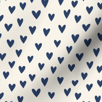 navy blue hearts on a cream background