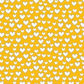 White hearts on golden yellow background