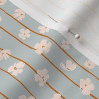 (S) Peach flowers on green and orange vertical stripes background
