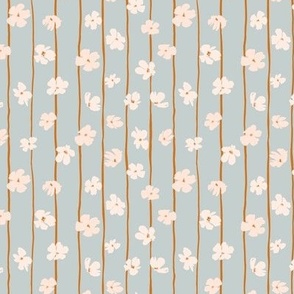 (S) Peach flowers on green and orange vertical stripes background