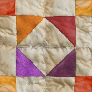 Worn quilt in orange and lavender