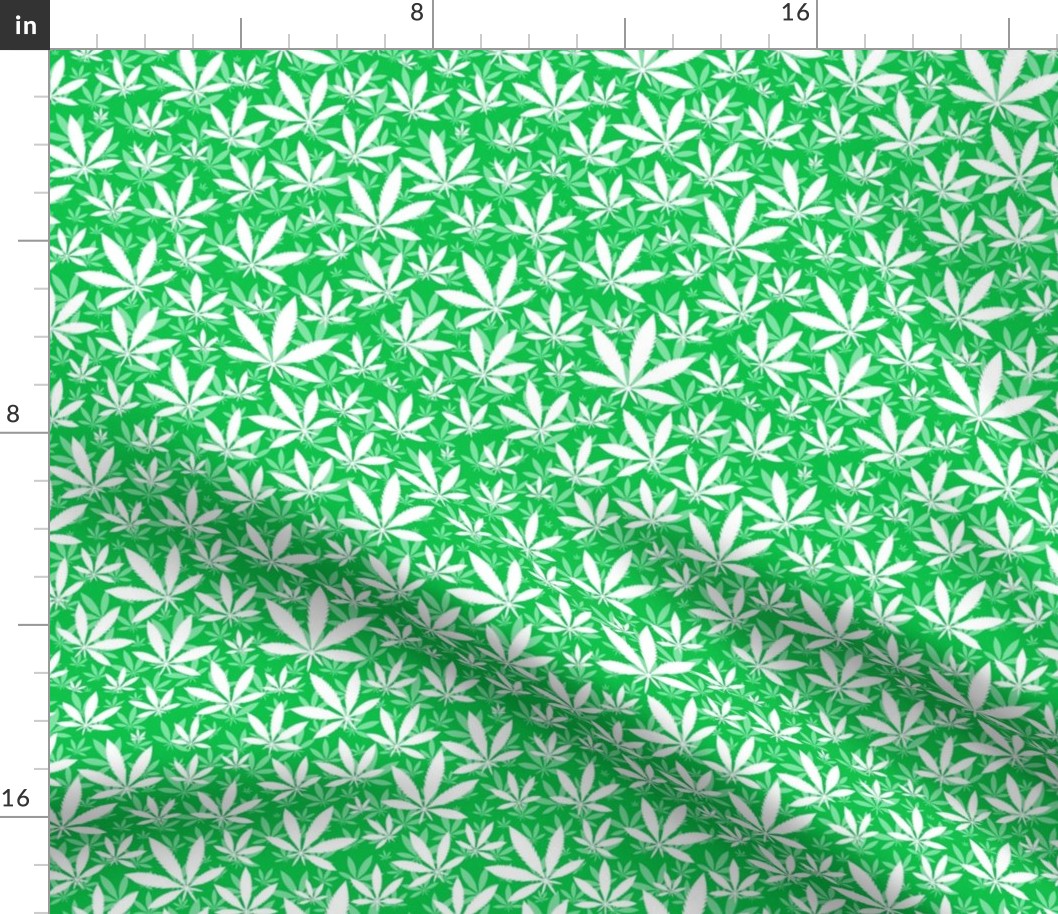Smaller Scale Marijuana Cannabis Leaves White on Grass Green