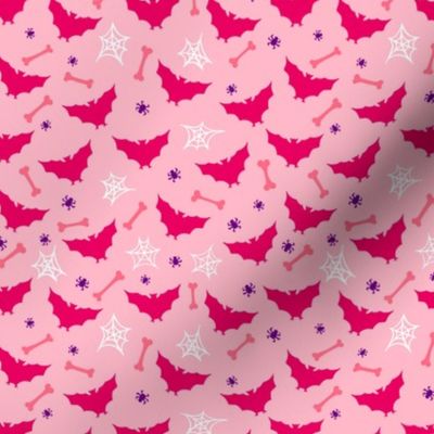 cute pink halloween bats, bones and spiderweb