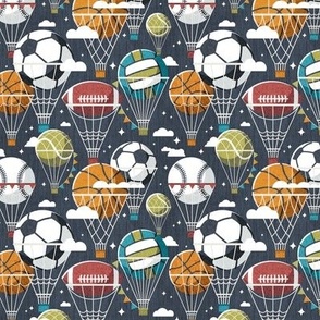 Tiny scale // Dream above // hale navy background football basketball volleyball tennis baseball American football dreamy balls hot air balloons on sky with clouds and stars wallpaper nursery boys room