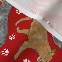 Trotting Australian Cattle Dogs and paw prints - red