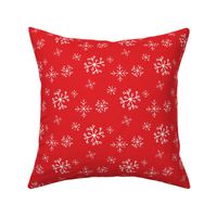 Snowflakes Drawn by Hand on a Christmas Red Background