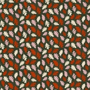 Cream, red orange, pink oak leaves on green background - small scale