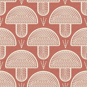 Design with vector symmetrical mushrooms drawn with a dotted line in white on an orange background