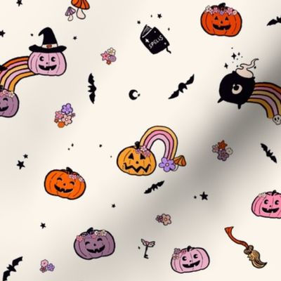 Sweet Halloween toss, cauldrons pumpkins ands rainbows, bright orange and dusky mauve 