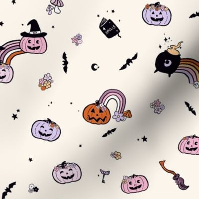 Sweet Halloween toss, cauldrons pumpkins ands rainbows, pale lavender and retro orange
