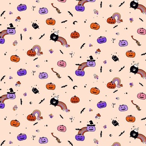 Sweet Halloween toss, cauldrons pumpkins ands rainbows, bright orange and violet
