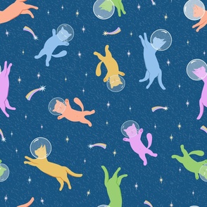 Space cats. Yellow, pink and green cats in blue starry night sky