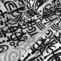 artistic brushstroke worldly tribal symbols black and white