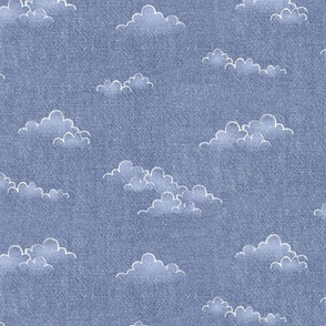 Chambray Cotton Clouds in Stonewash Blue | Hand drawn, summer clouds on natural cotton, chambray pattern, warp and weft weave pattern, sky with clouds on stonewash denim blue.