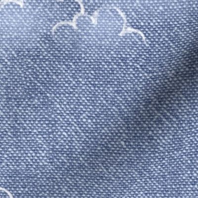 Chambray Cotton Clouds in Stonewash Blue (xl scale) | Hand drawn, summer clouds on natural cotton, chambray pattern, warp and weft weave pattern, sky with clouds on stonewash denim blue.