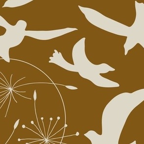 (M) beige birds and dandelion rings flying in the bright copper sky