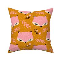 Cute pink foxes pattern on a mustard background