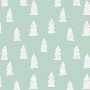 white christmas trees on mint green background - large