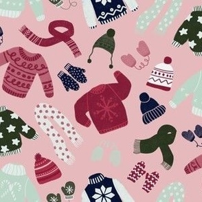 holiday sweaters on pink background  - large