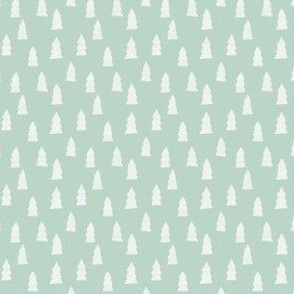 white christmas trees on mint green background - small