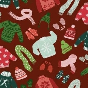 holiday sweaters on wine red background - large