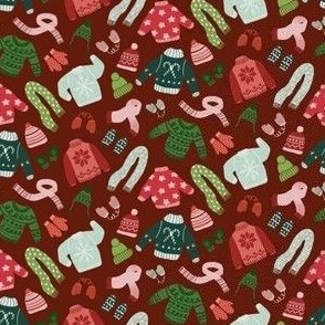 holiday sweaters on wine red background - small