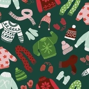 holiday sweaters on green background - large