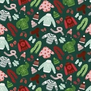 holiday sweaters on green background - small