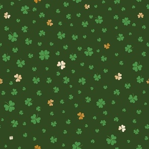 Three and four-leafed lucky clover, green and gold Shamrock
